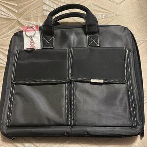 Targus Laptop Bag 2 pockets on front one pocket rear and one pocket inside.